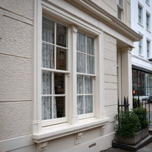 a classic Victorian sash window on a perfectly maintained Chelsea, London townhouse